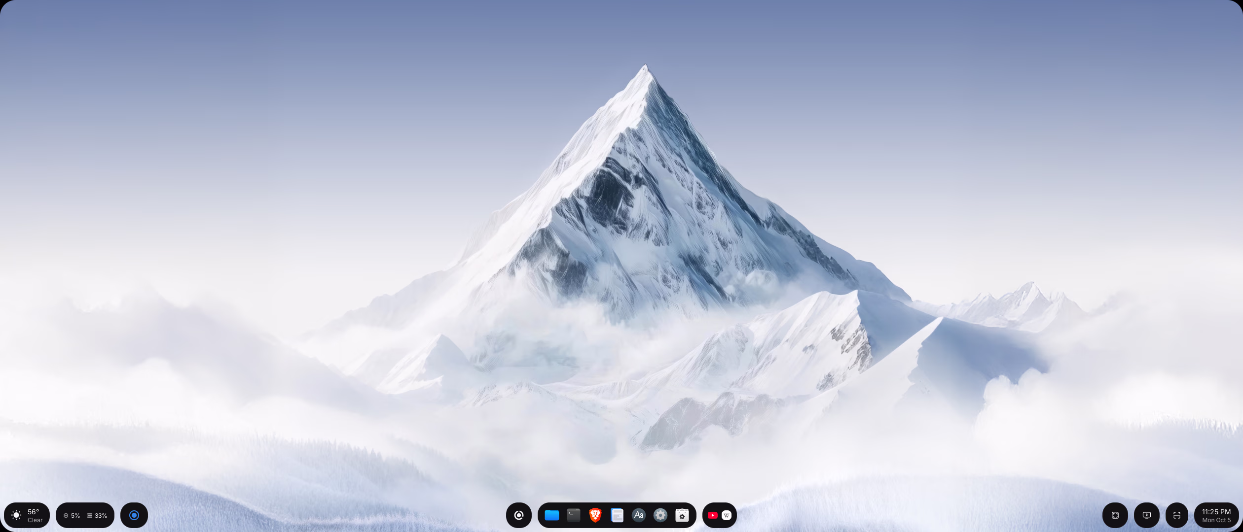 The DivisionOS desktop: a snowy mountain wallpaper with the panels along the bottom